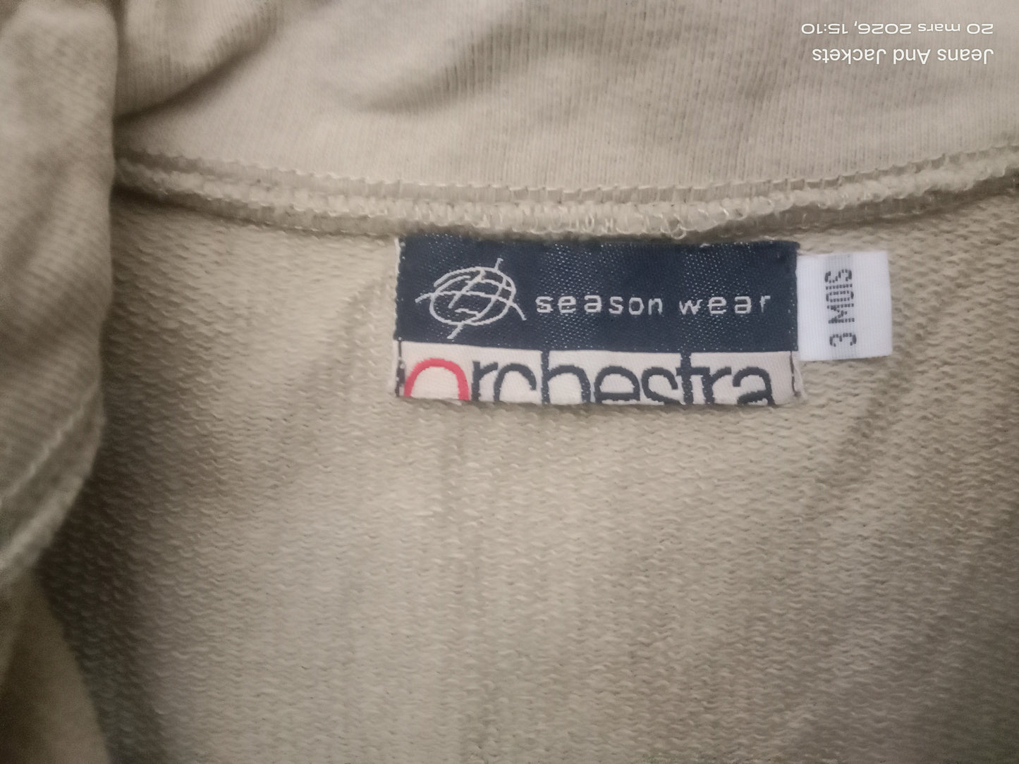 Jeans And Jackets beige cotton blend zip-up sweatshirt with "season wear" and "orchestra" labels.